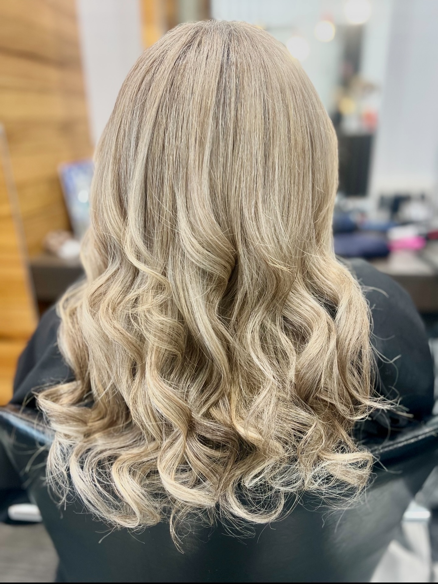 Blonde blow wave with bouncy curls