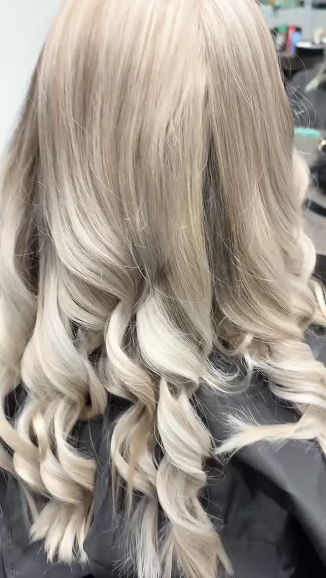 Icy platinum blonde with soft curls