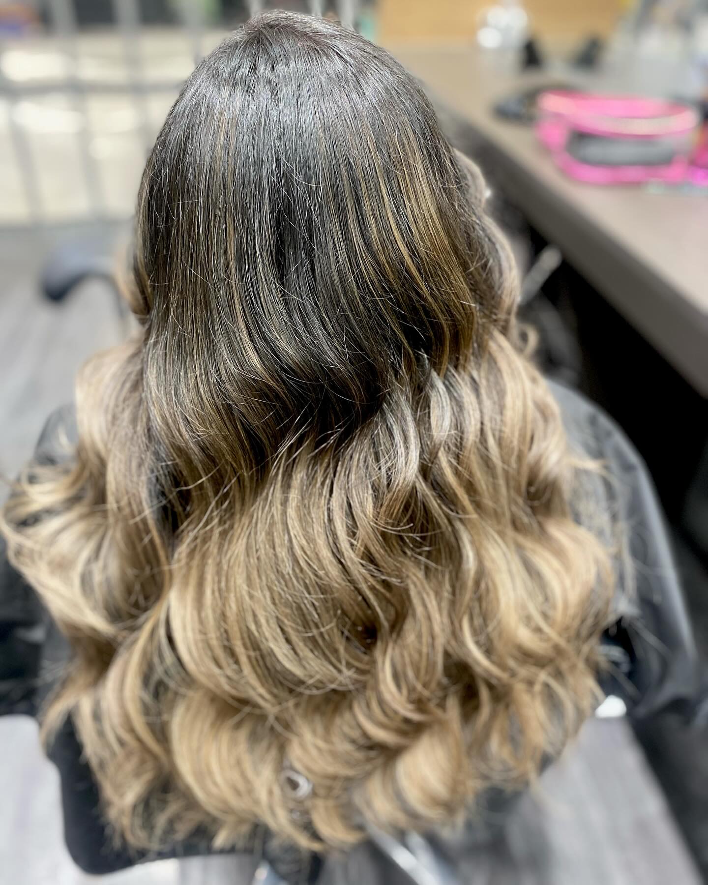 Dark root to blonde balayage with waves
